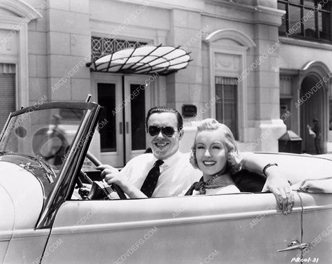 great candid Betty Grable Robert Florey in her new automobile 5715-25