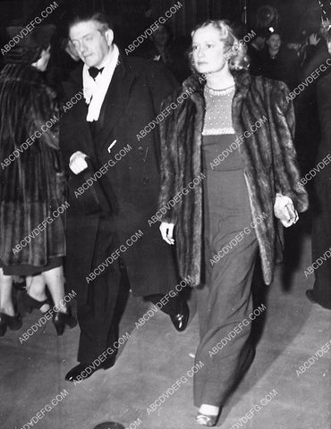 Anatole Litvak Miriam Hopkins arrive at film premiere 6006-13