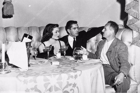 Gene Tierney Tyrone Power Darryl F Zanuck candid having dinner together 6016-16