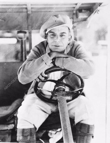silent film actor and director James Cruze behind the wheel of a car 6035-15