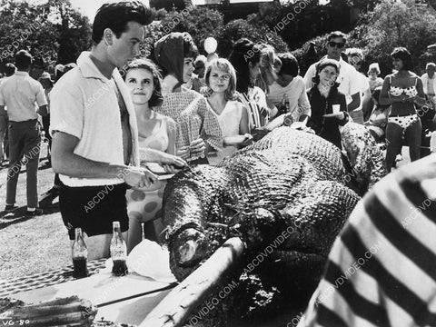 Tommy Kirk and the crew at the barbeque film Village of the Giants 6170-19