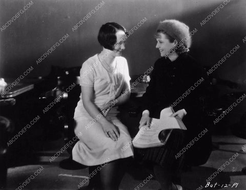 candid Janet Gaynor and cute actress going over the script unknown silent film 6273-19