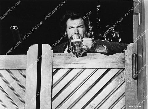 Clint Eastwood w a glass of beer film Joe Kidd 6389-15