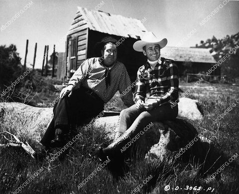 Smiley Burnette and Monte Montana take it easy between takes 6428-19