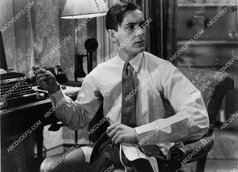 Tyrone Power sewing his pants film Love Is News 6563-13