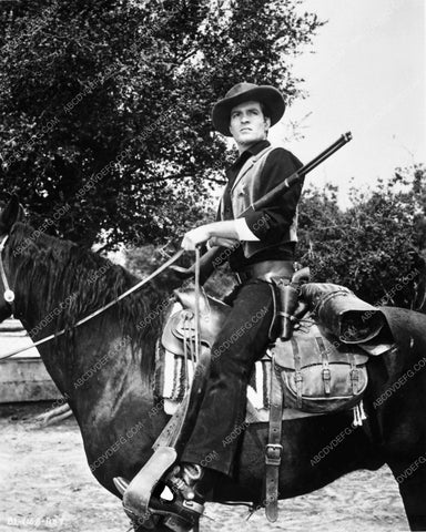 Hugh O'Brian on horse in western scene 6604-31