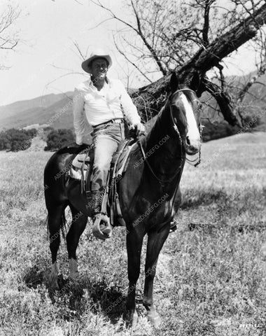 Joel McCrea on horse in western scene 6604-33