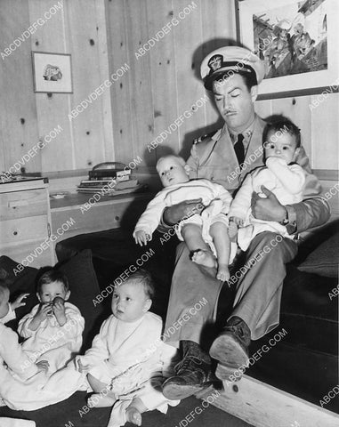 Robert Taylor and a bunch of babies film Stand By for Action 6628-30