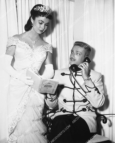 Betta St John John Ericson make a telephone call on set film The Student Prince 6720-33