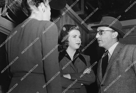 candid Gale Sondergaard, Deanna Durbin w director Richard Siodmak on set film Christmas Holiday 7019-032