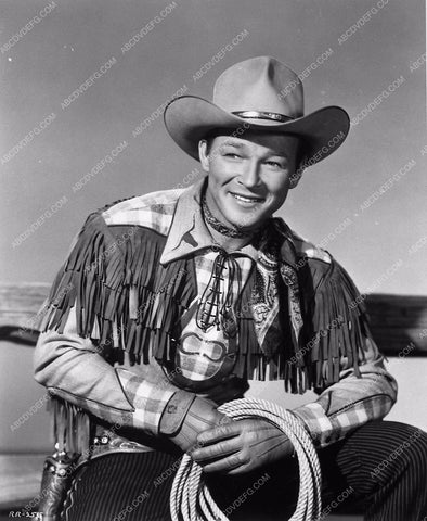 Roy Rogers posing by fence 7763a-19