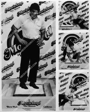 Lou Ferrigno does hand footprints in cement for Movieland Wax Museum 8201-24