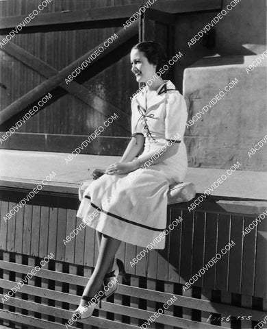 candid Dorothy Lamour sitting outside the soundstage 8242-8