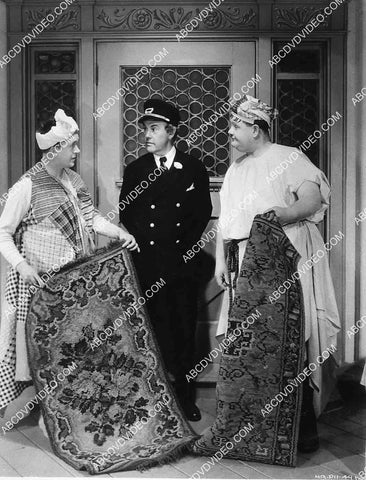 Stan Laurel Oliver Hardy cleaning the rugs film Our Relations 8244-6