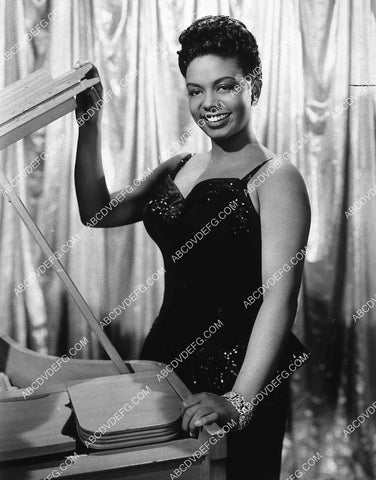 jazz pianist and singer beautiful Hazel Scott sitting at the piano 8668-10