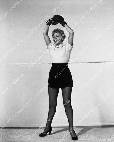 Shelley Winters in her fishnets and boxing gloves 8730-16