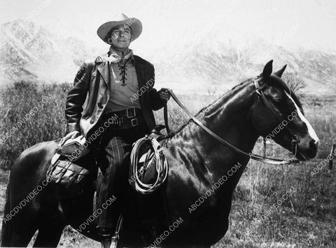 Randolph Scott on horseback 8730-23