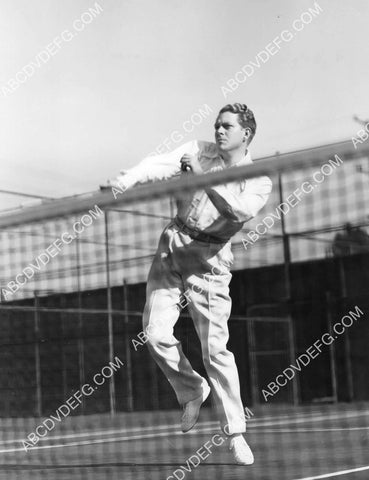 athletic Nelson Eddy on the tennis court 8B11-759