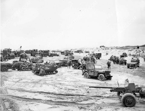 WWII D-Day plus 5 tanks and jeeps on Normandy Beach 8B11-818