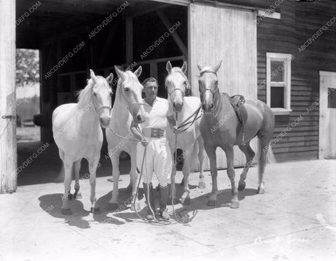 Buck Jones and equestrian garb goes horseback riding 8b03-361