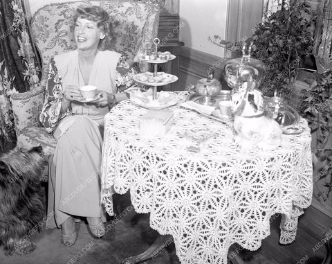 Jeanette MacDonald enjoys tea at home 8b03-884