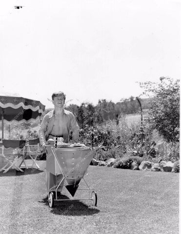 candid Mickey Rooney in his backyard with portable barbecue 8b4-682
