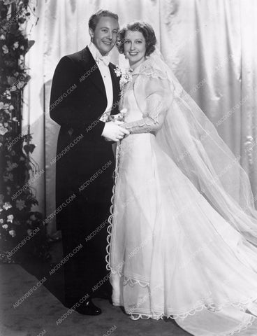 Jeanette MacDonald and I don't know who (Gene Raymond?) 8b4-915
