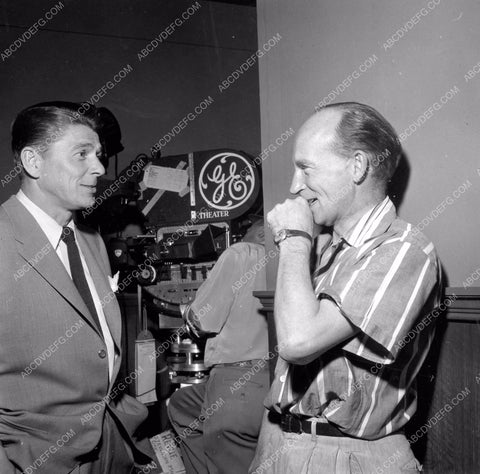 Ronald Reagan and technician behind scenes TV G. E. Theater 8b6-298