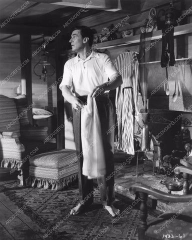 Walter Pidgeon gets dressed film Julia Misbehaves 8b6-388