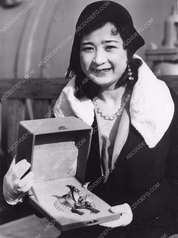 Japanese Opera star Kyoke Inouye prays for Lindbergh Baby 8b6-594