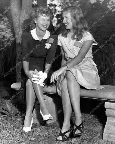 unidentified girls talking on park bench at college maybe 8b6-651