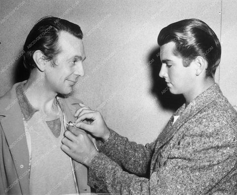 candid Raymond Massey getting wings pinned to lapel 9057-26