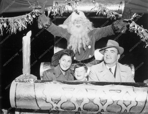 candid Pat O'Brien and family visiting Santa Clasu 9077-18