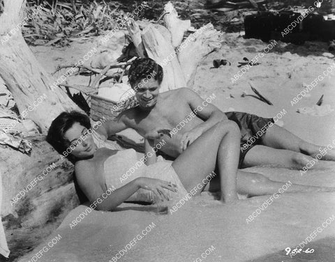 Joan Collins laying in the surf film Island in the Sun 9272-30