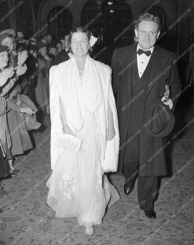 1938 Oscars Spencer Tracy and wife ? Arriving at the ceremonies aa1938-08</br>Los Angeles Newspaper press pit reprints from original 4x5 negatives for Academy Awards.