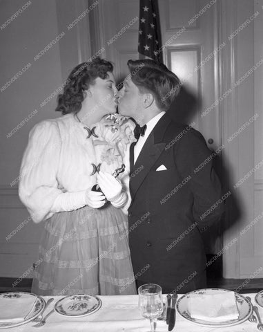 1939 Oscars Judy Garland Mickey Rooney kissing for cameras aa1939-15</br>Los Angeles Newspaper press pit reprints from original 4x5 negatives for Academy Awards.