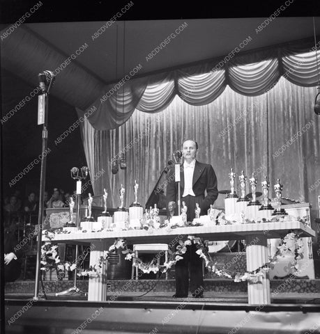 1940 Oscars Darryl F. Zanuck on stage Academy Awards with statues aa1940-05</br>Los Angeles Newspaper press pit reprints from original 4x5 negatives for Academy Awards.