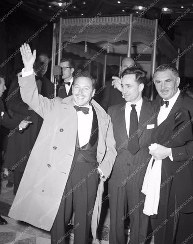 1951 Oscars Elia Kazan and friends arriving Academy Awards aa1951-14</br>Los Angeles Newspaper press pit reprints from original 4x5 negatives for Academy Awards.