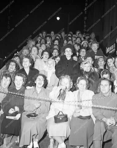 1951 Oscars throngs of fans outside event Academy Awards aa1951-42</br>Los Angeles Newspaper press pit reprints from original 4x5 negatives for Academy Awards.