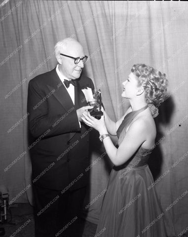 1952 Oscars Claire Trevor presenting best sound Academy Award aa1952-13</br>Los Angeles Newspaper press pit reprints from original 4x5 negatives for Academy Awards.