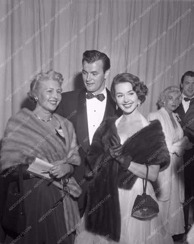 1954 Oscars Barbara Rush Rock Hudson background Academy Awards aa1954-03</br>Los Angeles Newspaper press pit reprints from original 4x5 negatives for Academy Awards.