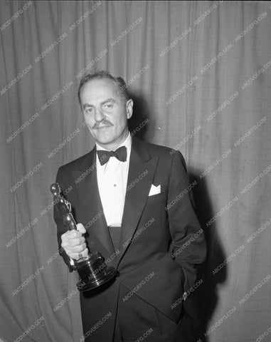 1954 Oscars Darryl F. Zanuck and statue Academy Awards aa1954-16</br>Los Angeles Newspaper press pit reprints from original 4x5 negatives for Academy Awards.