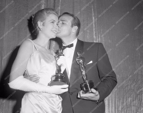 1954 Oscars Grace Kelly Marlon Brando congrat kiss Academy Awards aa1954-50</br>Los Angeles Newspaper press pit reprints from original 4x5 negatives for Academy Awards.