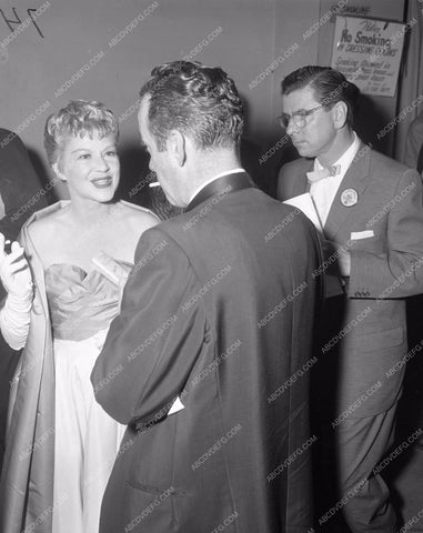 1957 Oscars Claire Trevor backstage Academy Awards aa1956-51</br>Los Angeles Newspaper press pit reprints from original 4x5 negatives for Academy Awards.