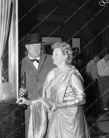 1958 Oscars Burl Ives and Wife and statue Academy Awards aa1958-19</br>Los Angeles Newspaper press pit reprints from original 4x5 negatives for Academy Awards.