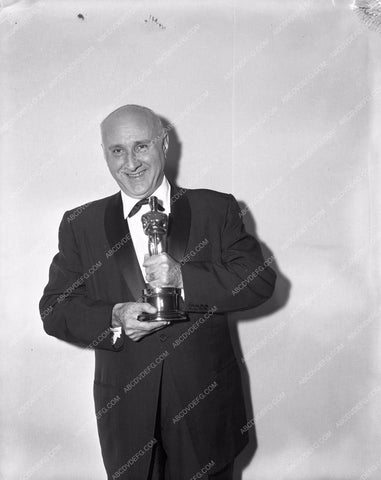 1958 Oscars Dimitri Tiomkin and his statue Academy Awards aa1958-22</br>Los Angeles Newspaper press pit reprints from original 4x5 negatives for Academy Awards.