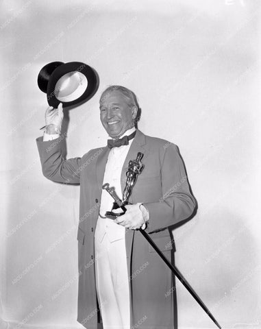 1958 Oscars Maurice Chevalier and statue Academy Awards aa1958-60</br>Los Angeles Newspaper press pit reprints from original 4x5 negatives for Academy Awards.