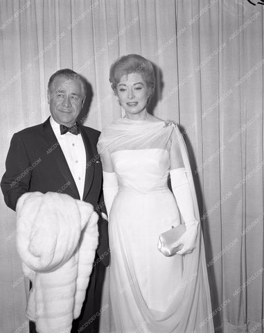 1960 Oscars Greer Garson and husband maybe Academy Awards aa1960-102</br>Los Angeles Newspaper press pit reprints from original 4x5 negatives for Academy Awards.