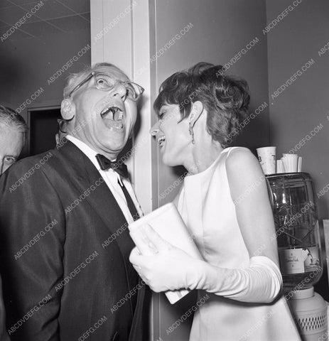 1964 Oscars George Cukor Audrey Hepburn backstage Academy Awards aa1965-07</br>Los Angeles Newspaper press pit reprints from original 4x5 negatives for Academy Awards.