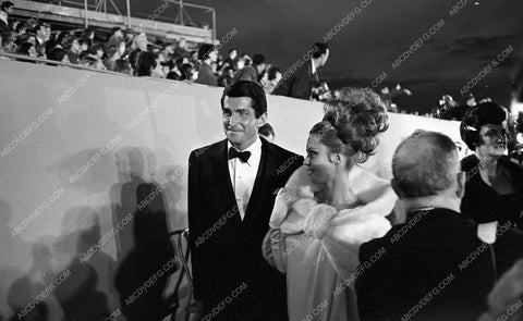 1964 Oscars George Hamilton and date big hair Academy Awards aa1965-13</br>Los Angeles Newspaper press pit reprints from original 4x5 negatives for Academy Awards.